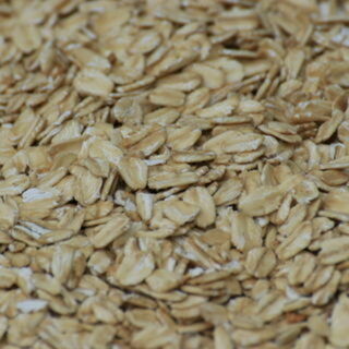 Rolled and flaked adjunct grains.